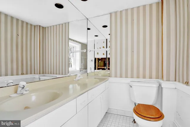 a utility room with closet dryer and washer