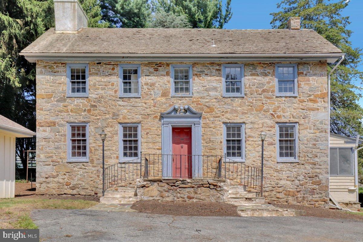 284 Old Mill Road Parkesburg, PA 19365 - Photo 3 of 50 a front view of a house with a yard