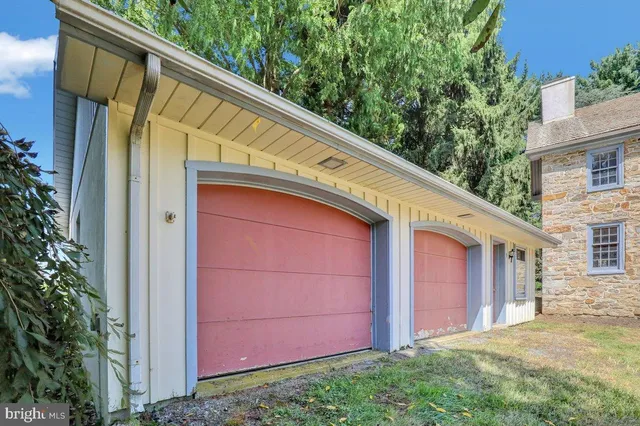 an aerial view of residential house with outdoor space