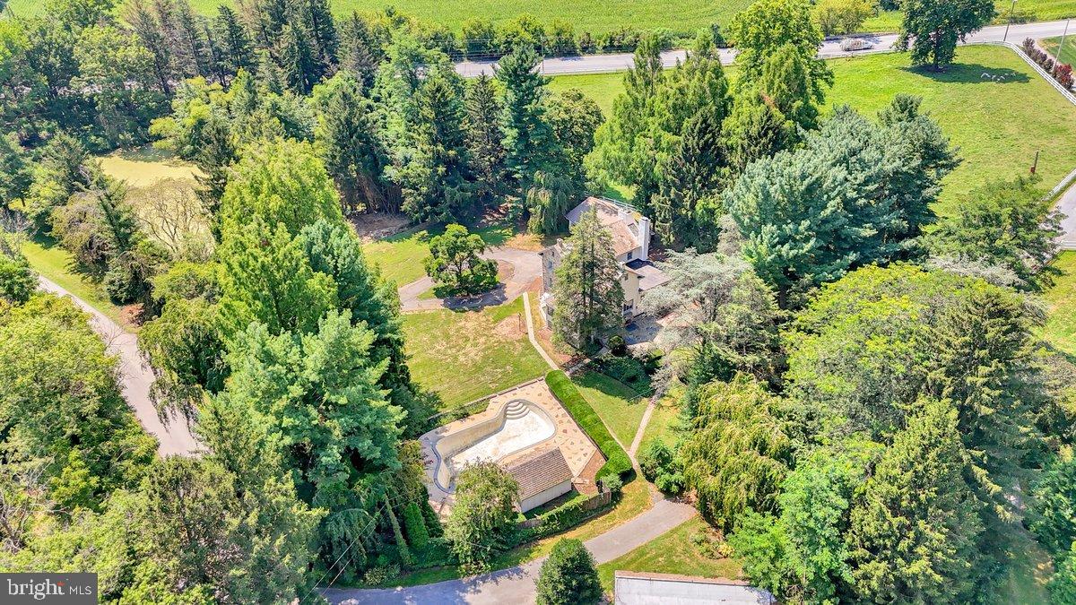 284 Old Mill Road Parkesburg, PA 19365 - Photo 49 of 50 an aerial view of residential house with outdoor space and trees all around