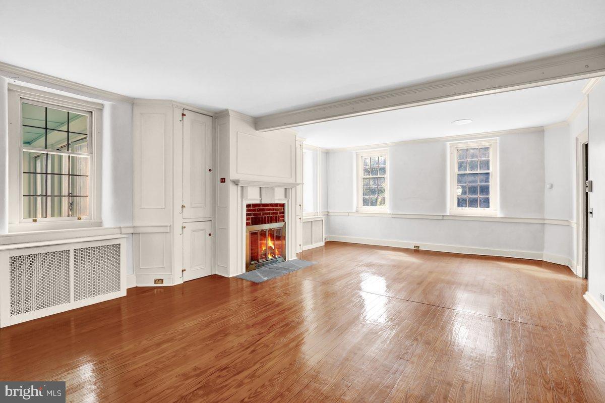 284 Old Mill Road Parkesburg, PA 19365 - Photo 8 of 50 a view of empty room with wooden floor and window