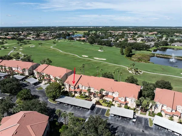 an aerial view of a house with a garden