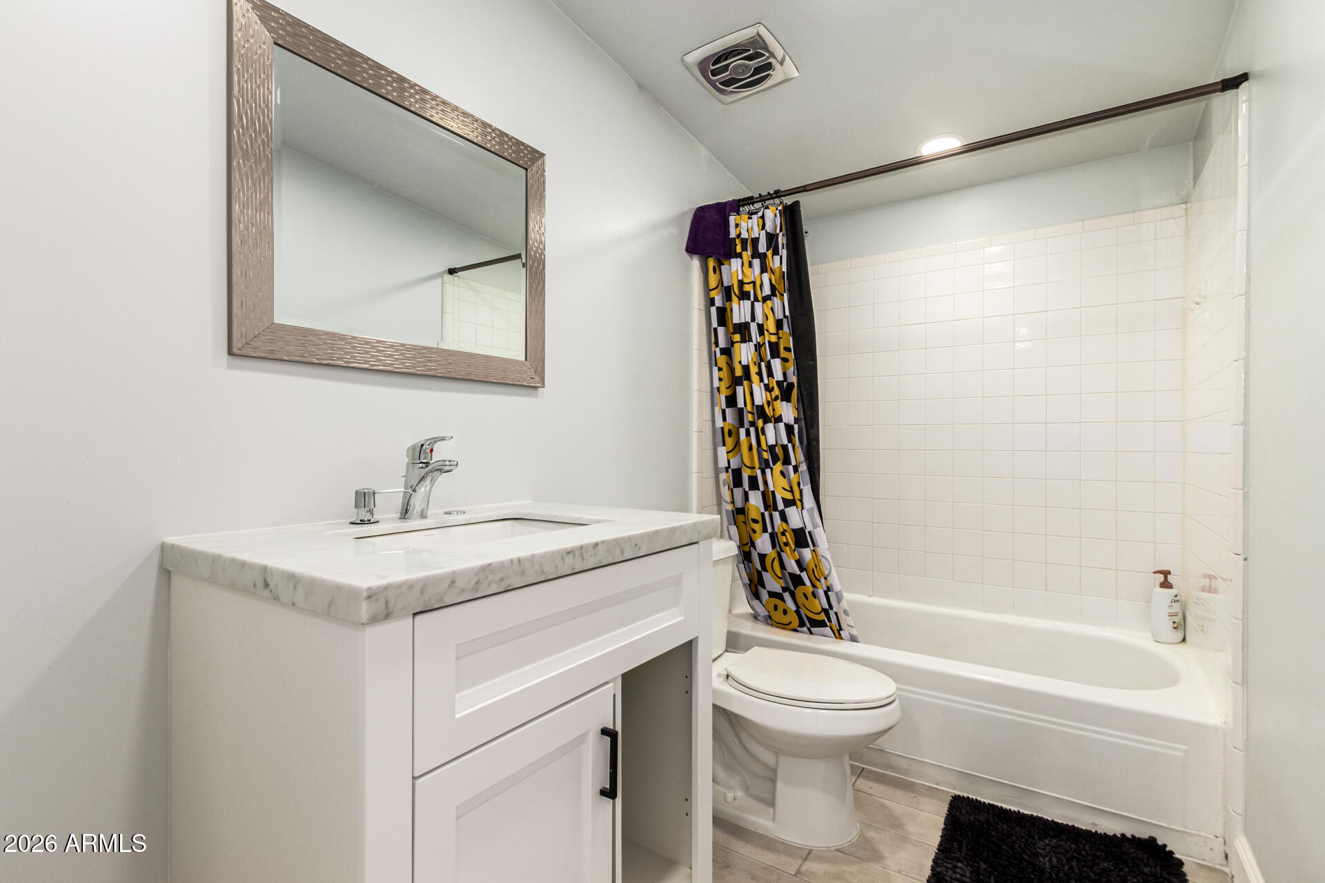 8218 West Osborn Road Phoenix, AZ 85033 - Photo 15 of 27 a bathroom with a sink toilet and shower