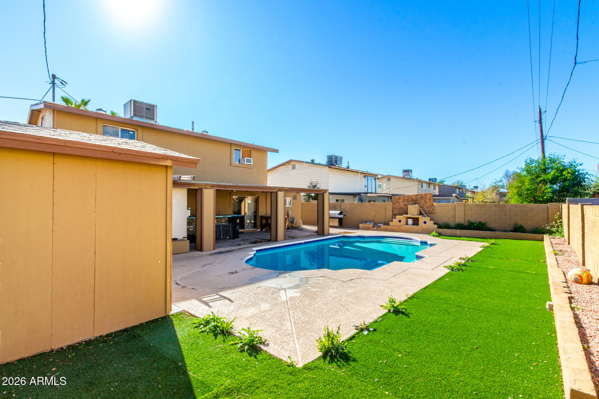8218 West Osborn Road Phoenix, AZ 85033 - Photo 2 of 27 a view of an house with backyard space and garden