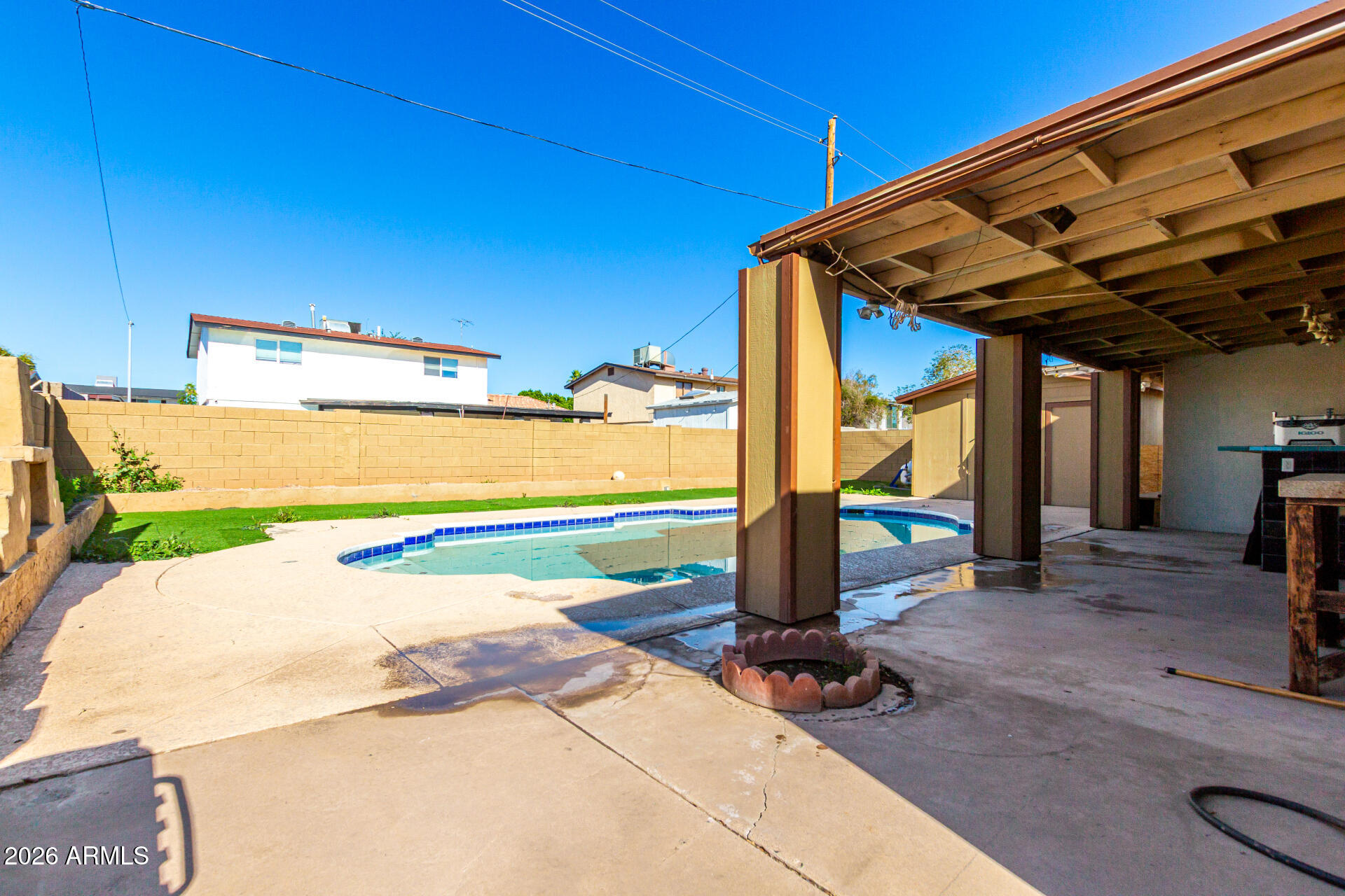 8218 West Osborn Road Phoenix, AZ 85033 - Photo 27 of 27 a view of a backyard with swimming pool