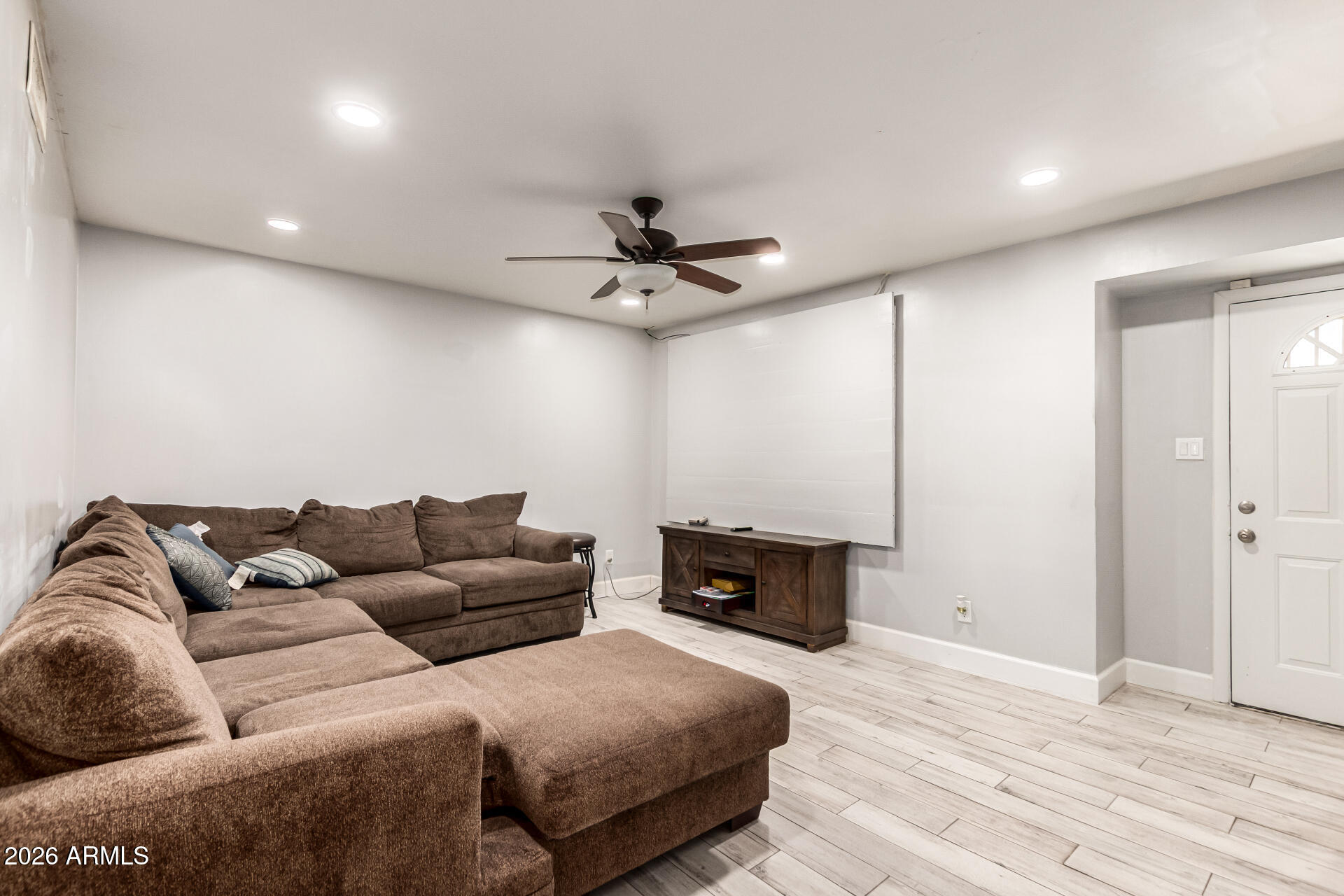 8218 West Osborn Road Phoenix, AZ 85033 - Photo 5 of 27 a living room with furniture