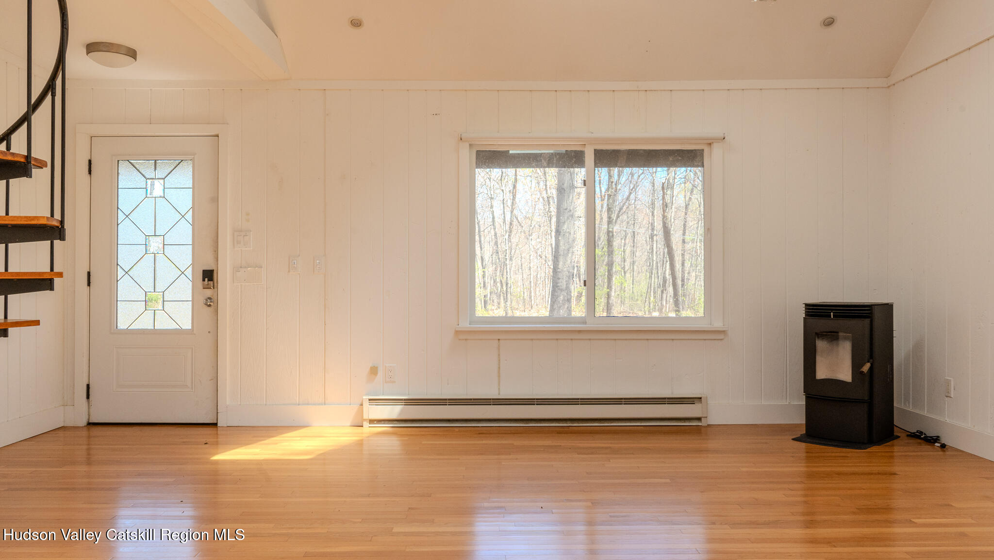 41 Pond Hill Road Copake, NY 12521 - Photo 13 of 25 a view of an empty room with window and wooden floor