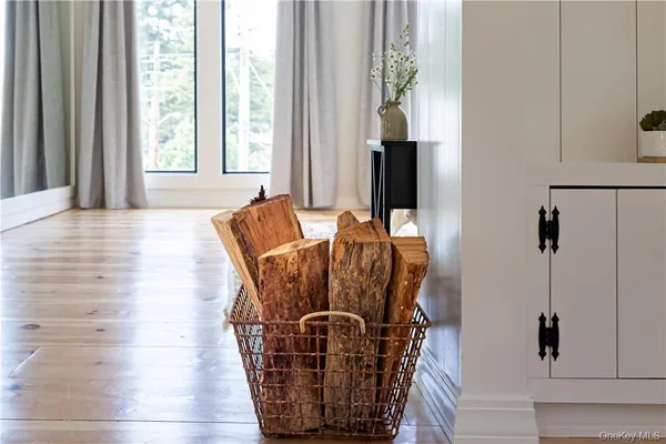 a close view of dining table with chairs