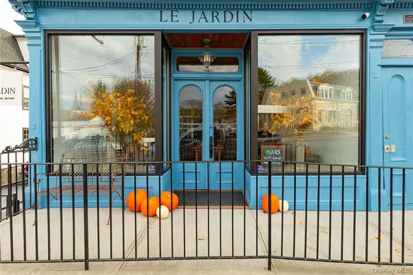 a view of a balcony with a floor to ceiling window