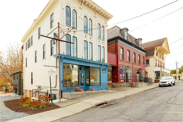 a view of a brick building with a large windows