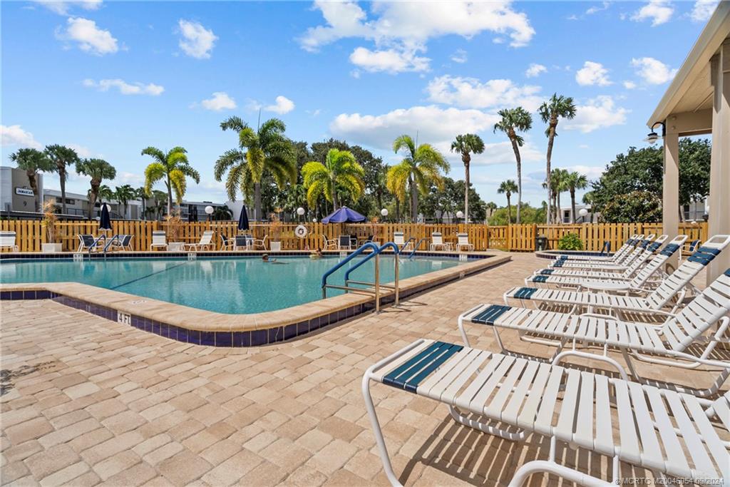 1950 Southwest Palm City Road, Unit 10205 Stuart, FL 34994 - Photo 26 of 28 Clubhouse pool