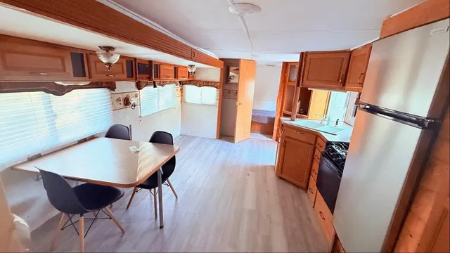 a view of a house with a back yard