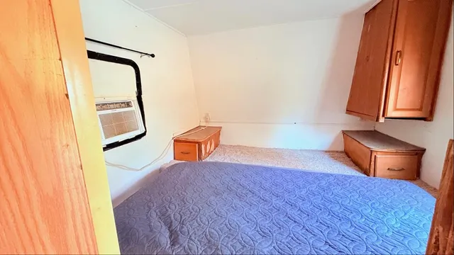 a room with a chair and a wooden floor