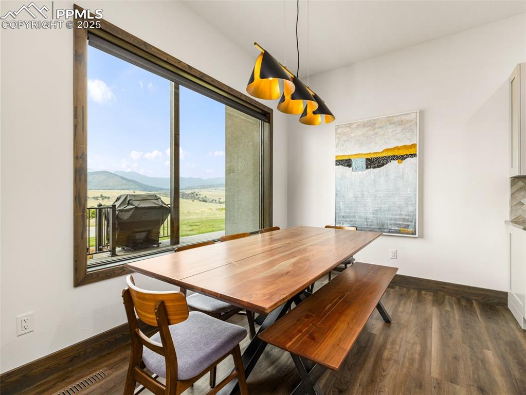 5843 Hart Ranch Drive Beulah, CO 81023 - Photo 13 of 50 a view of a living room with furniture and wooden floor