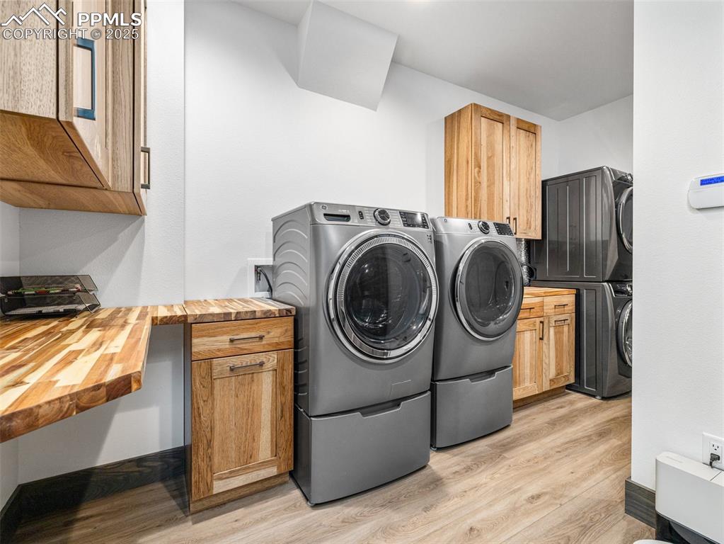 5843 Hart Ranch Drive Beulah, CO 81023 - Photo 24 of 50 a utility room with dryer and washer