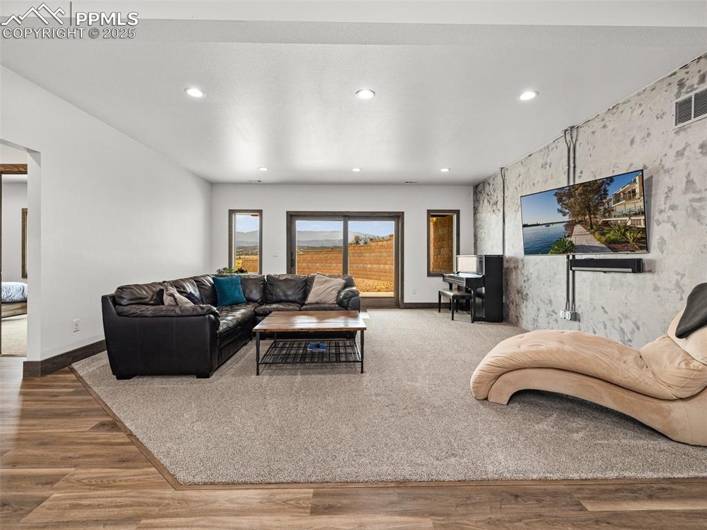 5843 Hart Ranch Drive Beulah, CO 81023 - Photo 29 of 50 a living room with furniture and a flat screen tv