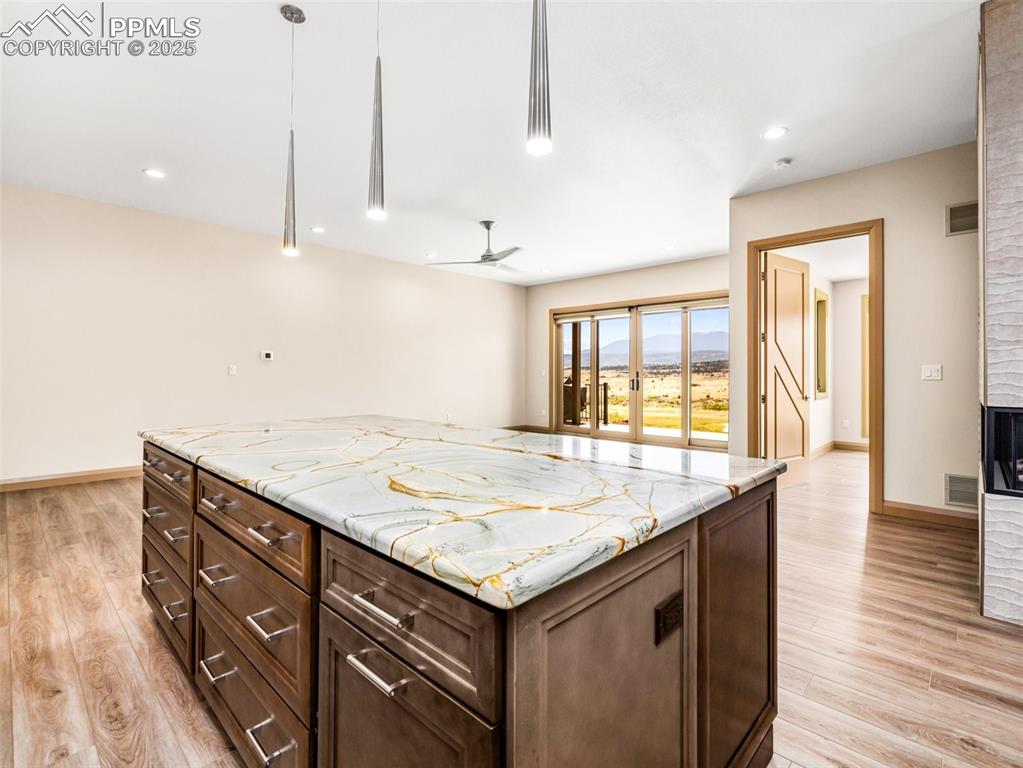 5843 Hart Ranch Drive Beulah, CO 81023 - Photo 41 of 50 a bathroom with a granite countertop sink and a large mirror