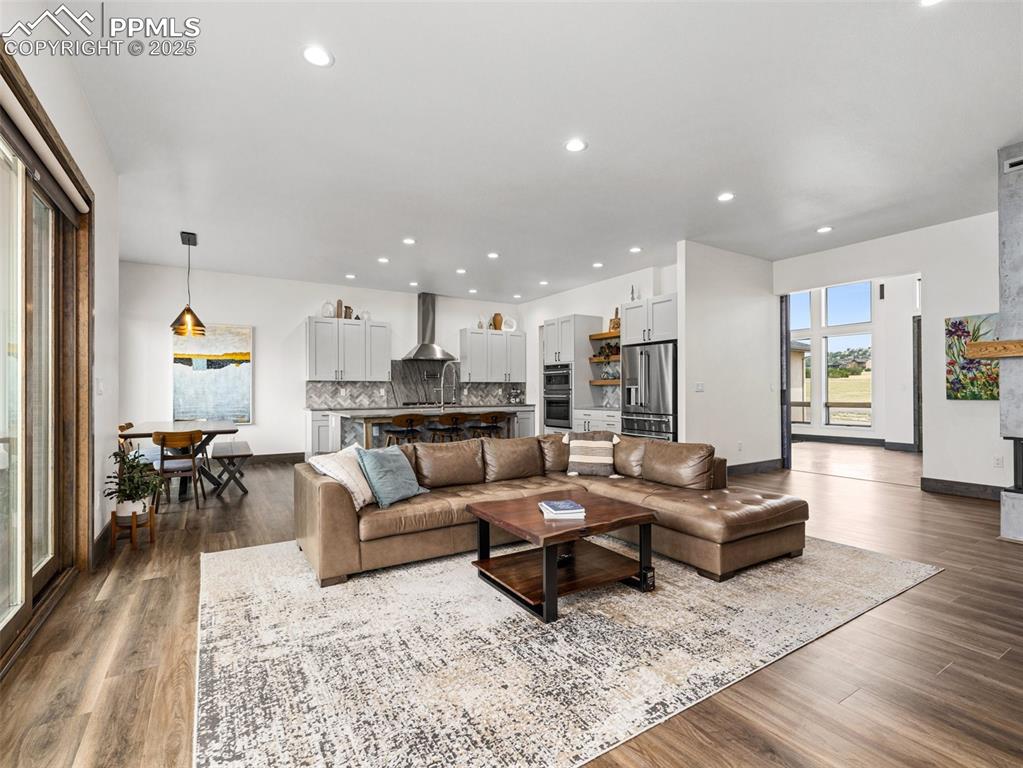 5843 Hart Ranch Drive Beulah, CO 81023 - Photo 9 of 50 a living room with furniture wooden floor and a table