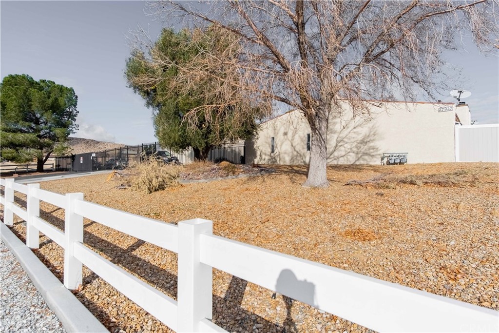 17910 Quantico Road Apple Valley, CA 92307 - Photo 1 of 1 a view of wooden fence and snow
