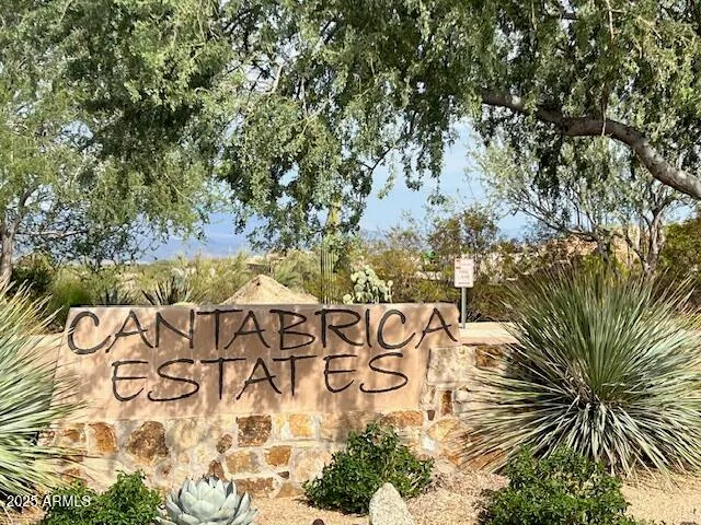 a bathroom with sink mirror and shower