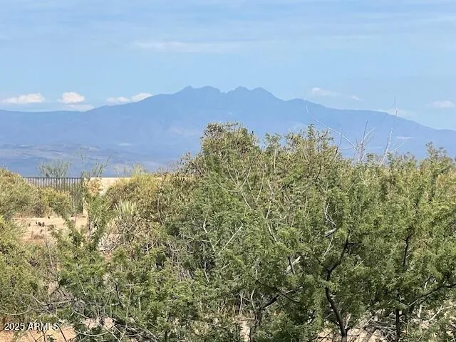 a sign that is on a brick wall