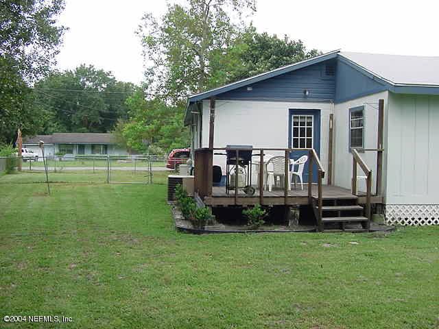 8903 Old Plank Road Jacksonville, FL 32220 - Photo 3 of 4 Back yard with deck