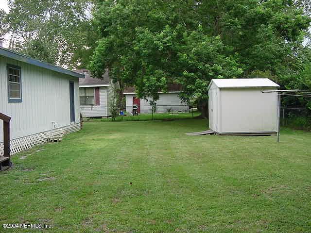 8903 Old Plank Road Jacksonville, FL 32220 - Photo 4 of 4 Back yard with shed