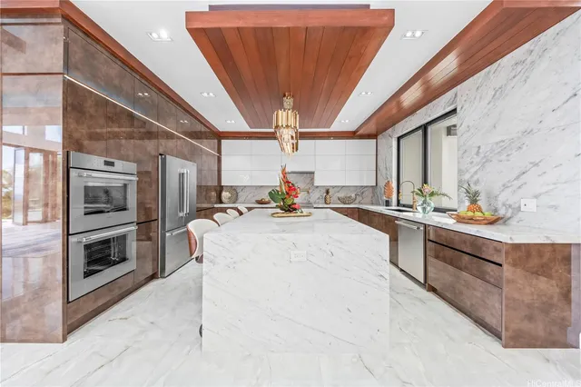 a bedroom with a bed mirror and window