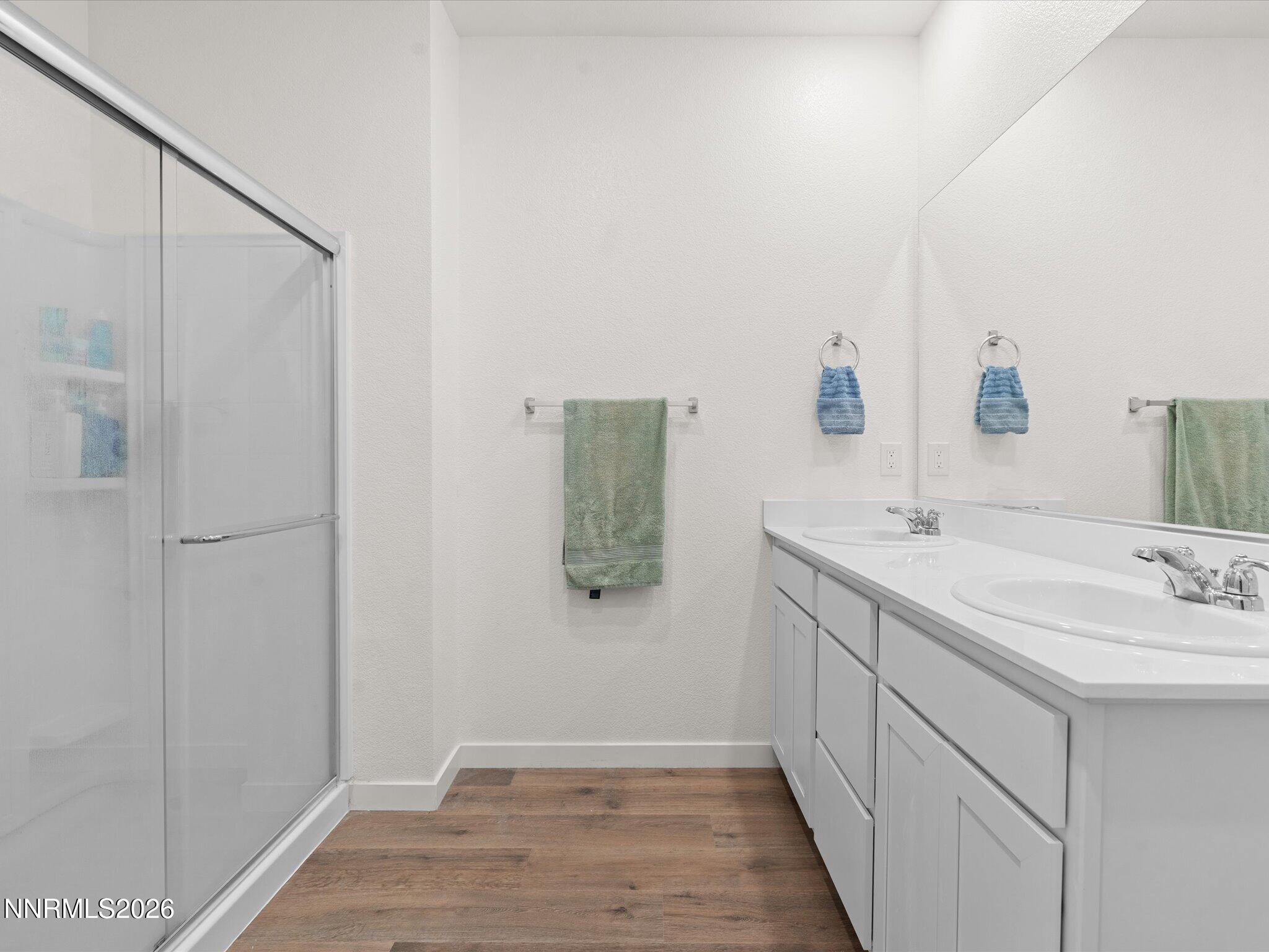 716 Butte Crk Road Dayton, NV 89403 - Photo 15 of 27 a bathroom with a sink and mirror