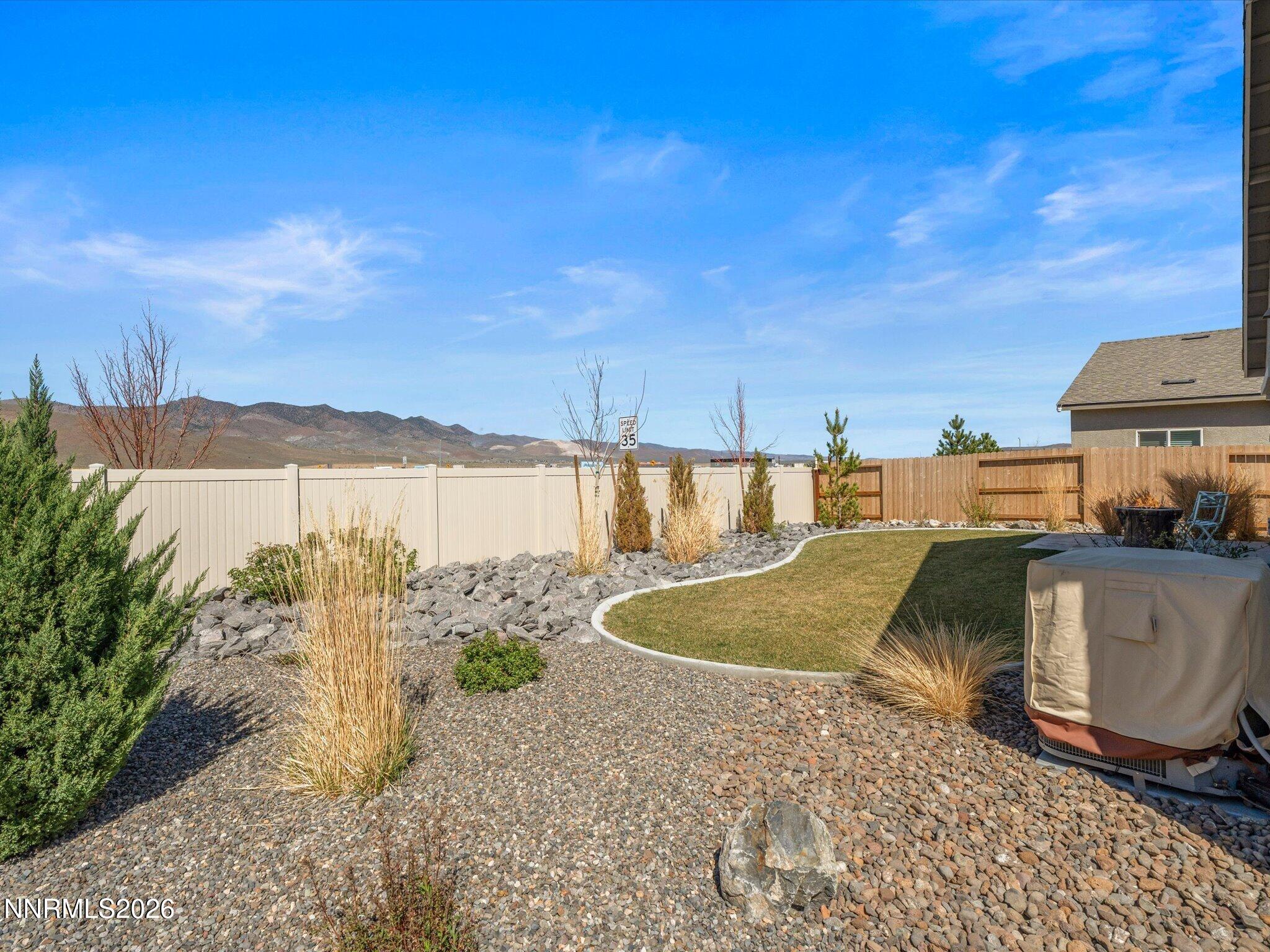716 Butte Crk Road Dayton, NV 89403 - Photo 4 of 27 a view of a swimming pool with a yard
