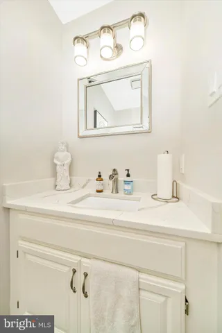 a bedroom with bed and a window