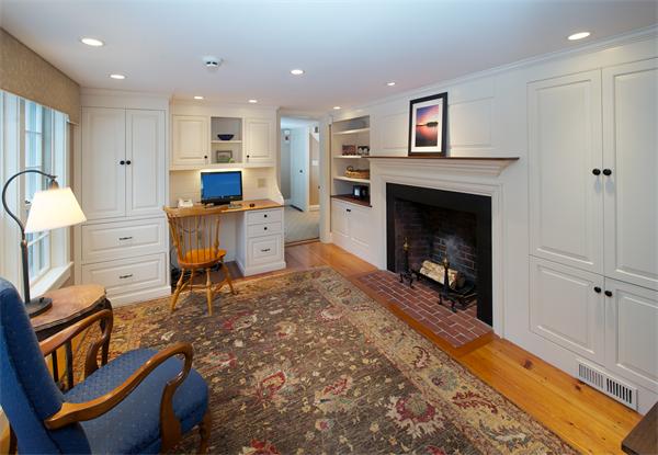 42 Topsfield Road Boxford, MA 01921 - Photo 13 of 30 a living room with furniture a fireplace and a flat screen tv