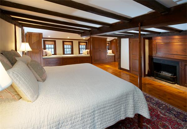 42 Topsfield Road Boxford, MA 01921 - Photo 17 of 30 a bed sitting in a bedroom next to a window