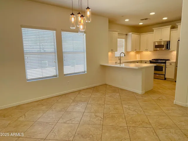 a view of kitchen and window