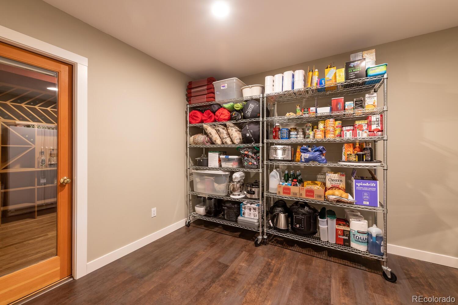 3828 Cloverleaf Drive Boulder, CO 80304 - Photo 26 of 40 a room with lots of books and a large window