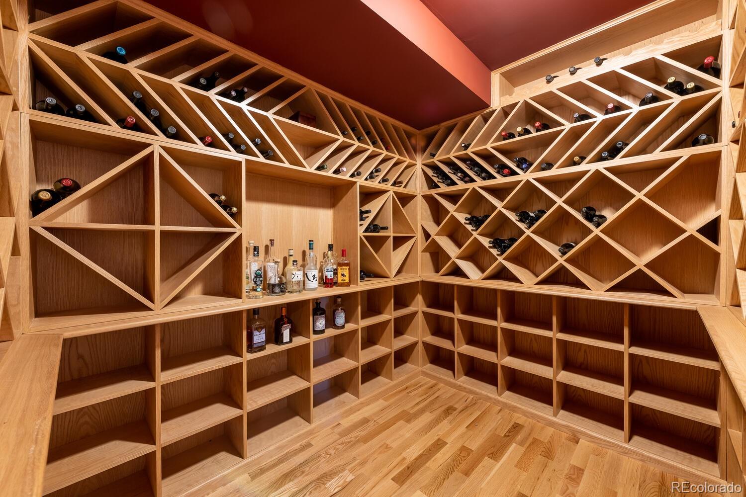 3828 Cloverleaf Drive Boulder, CO 80304 - Photo 27 of 40 a view of an empty room with wooden floor and windows