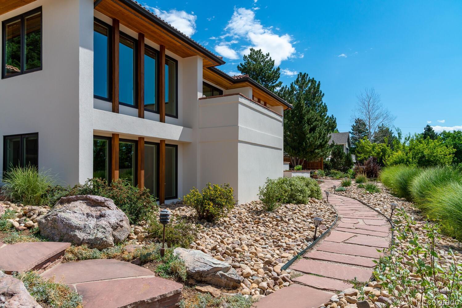 3828 Cloverleaf Drive Boulder, CO 80304 - Photo 3 of 40 a front view of house and yard with green space