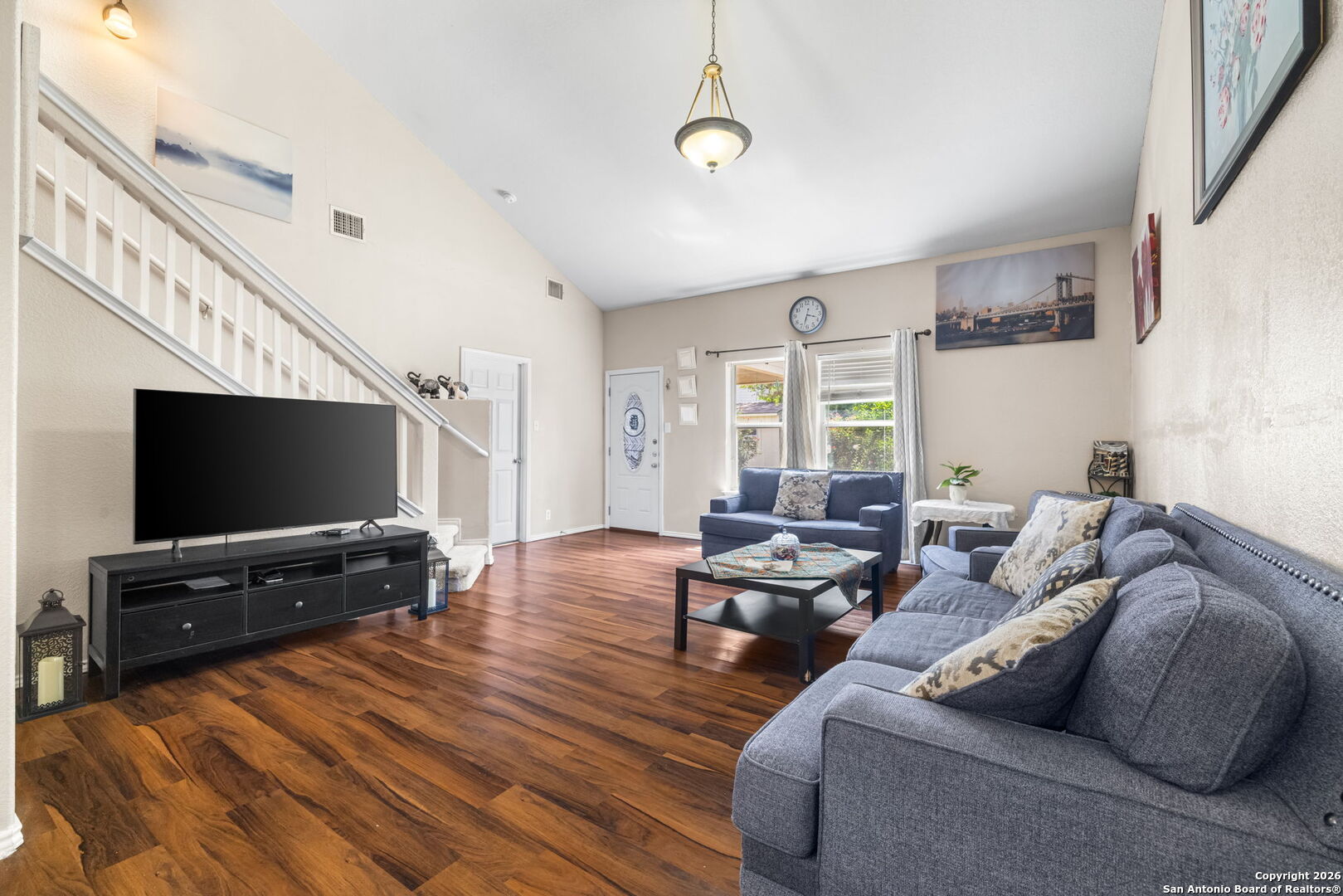6522 Charles Field Leon Valley, TX 78238 - Photo 11 of 30 a living room with furniture and a flat screen tv