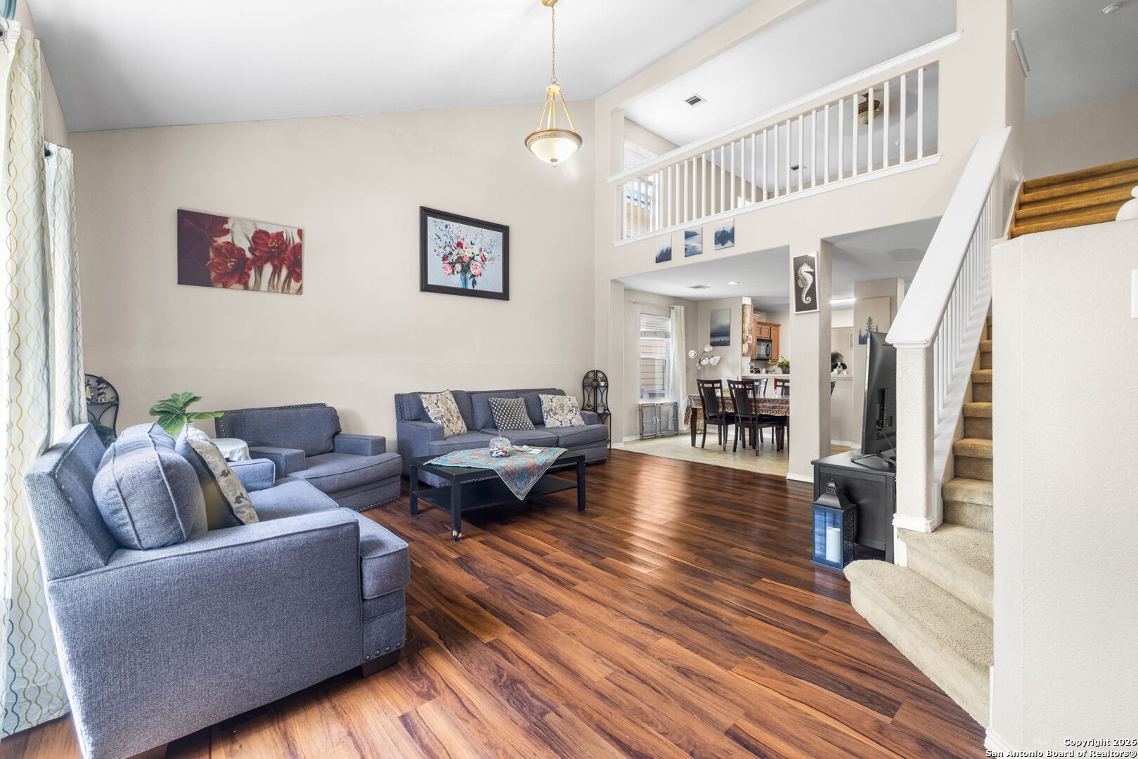 6522 Charles Field Leon Valley, TX 78238 - Photo 12 of 30 a living room with furniture and a wooden floor