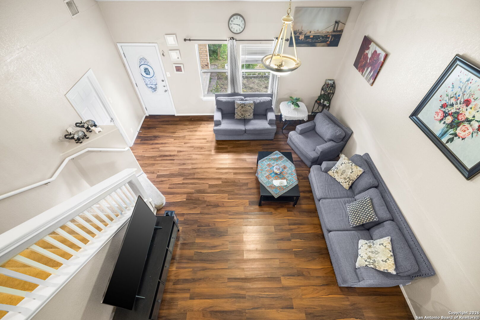 6522 Charles Field Leon Valley, TX 78238 - Photo 19 of 30 a living room with furniture and wooden floor
