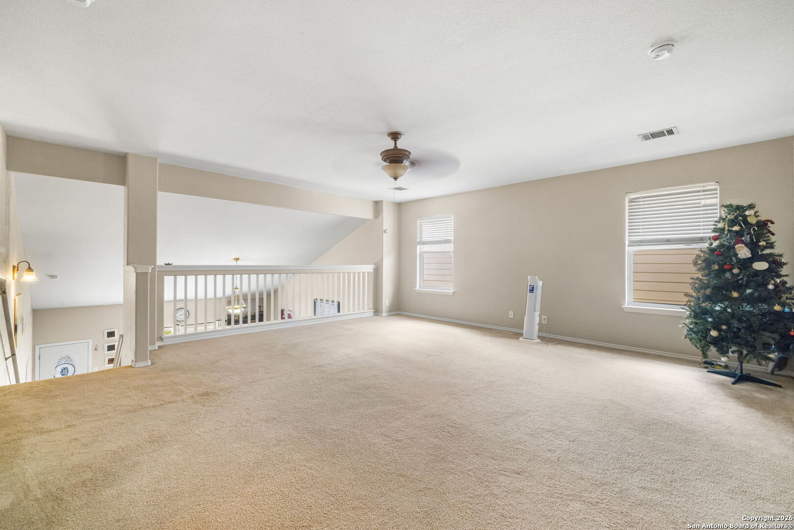 6522 Charles Field Leon Valley, TX 78238 - Photo 21 of 30 a view of an empty room with a window
