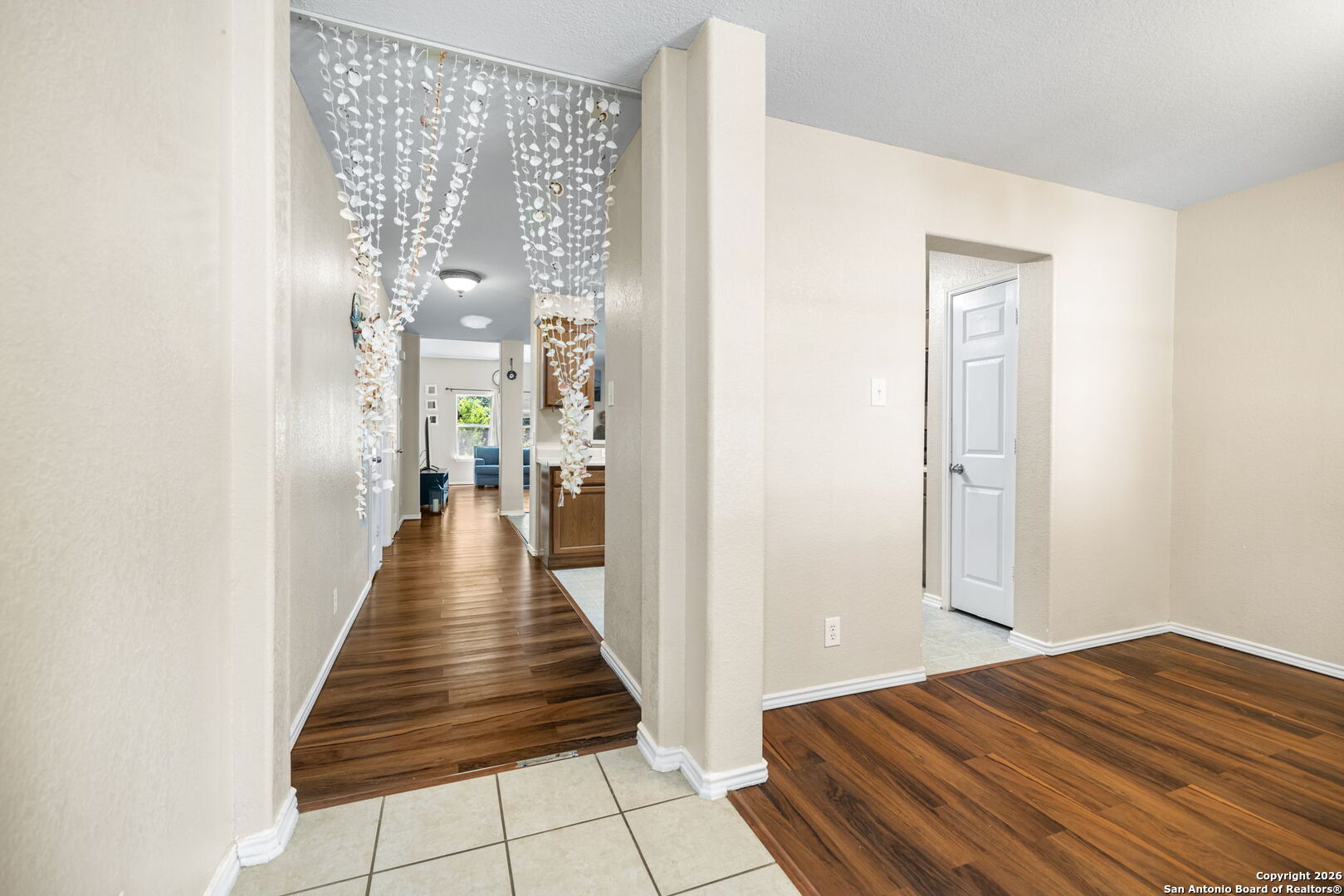 6522 Charles Field Leon Valley, TX 78238 - Photo 4 of 30 a view of a hallway with wooden floor and staircase