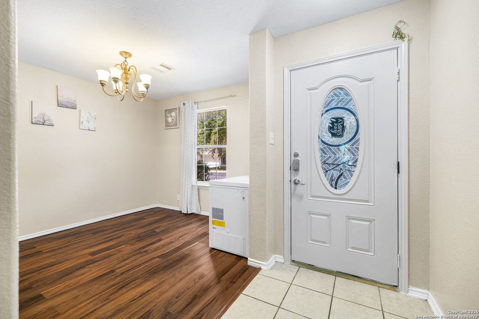 6522 Charles Field Leon Valley, TX 78238 - Photo 5 of 30 a view of a hallway with washer and dryer