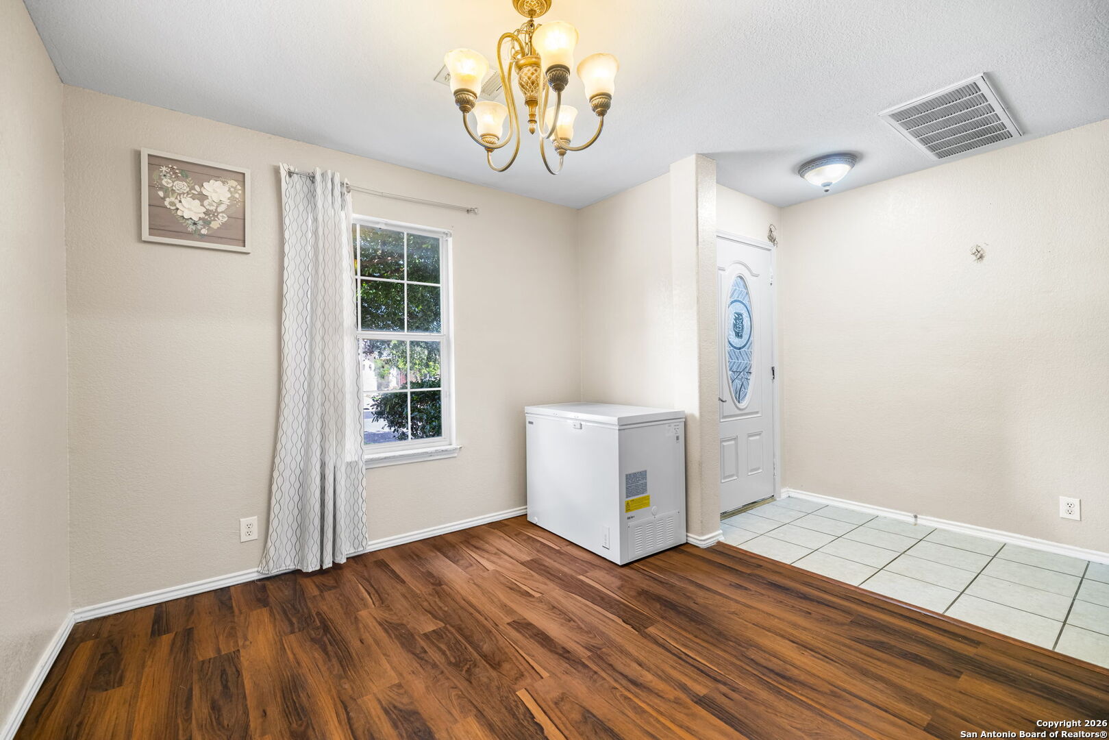 6522 Charles Field Leon Valley, TX 78238 - Photo 6 of 30 a view of empty room with wooden floor and fan
