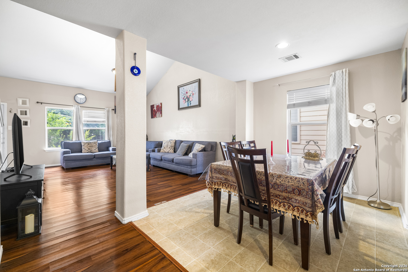 6522 Charles Field Leon Valley, TX 78238 - Photo 9 of 30 a view of a dining room with furniture and wooden floor