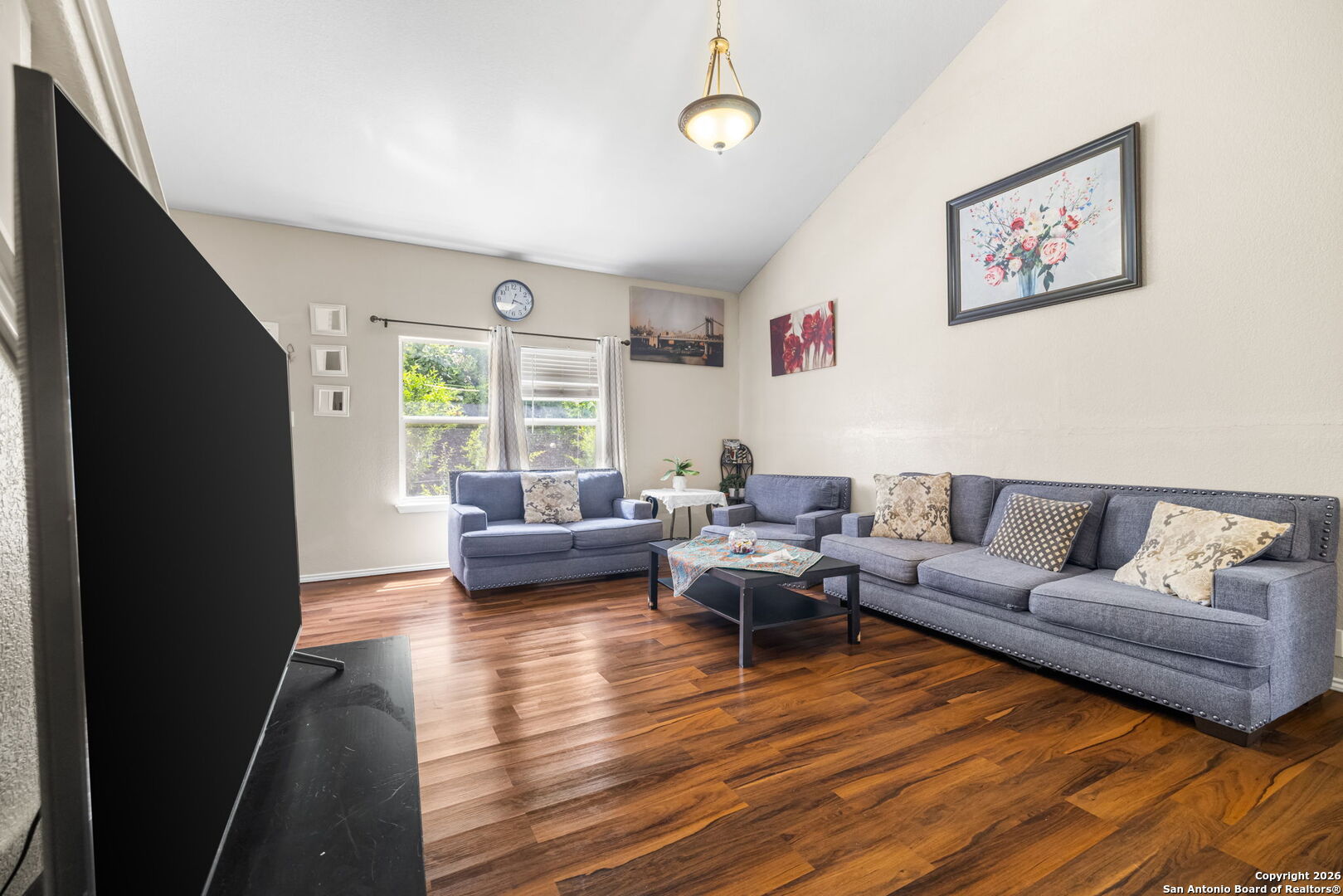 6522 Charles Field Leon Valley, TX 78238 - Photo 10 of 30 a living room with furniture and a large window
