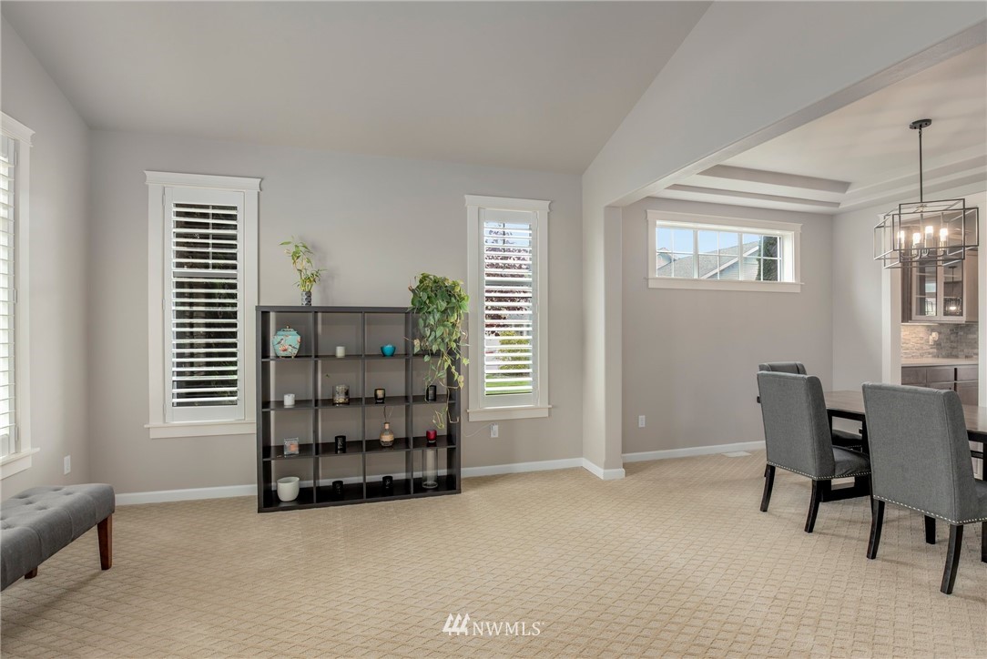 5805 Parker Road East Sumner, WA 98390 - Photo 4 of 40 a view of a bedroom with furniture and windows