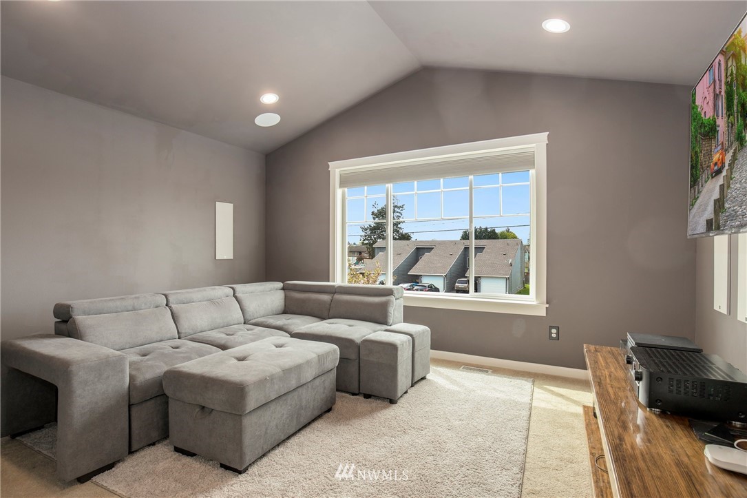 5805 Parker Road East Sumner, WA 98390 - Photo 34 of 40 a living room with furniture and a large window