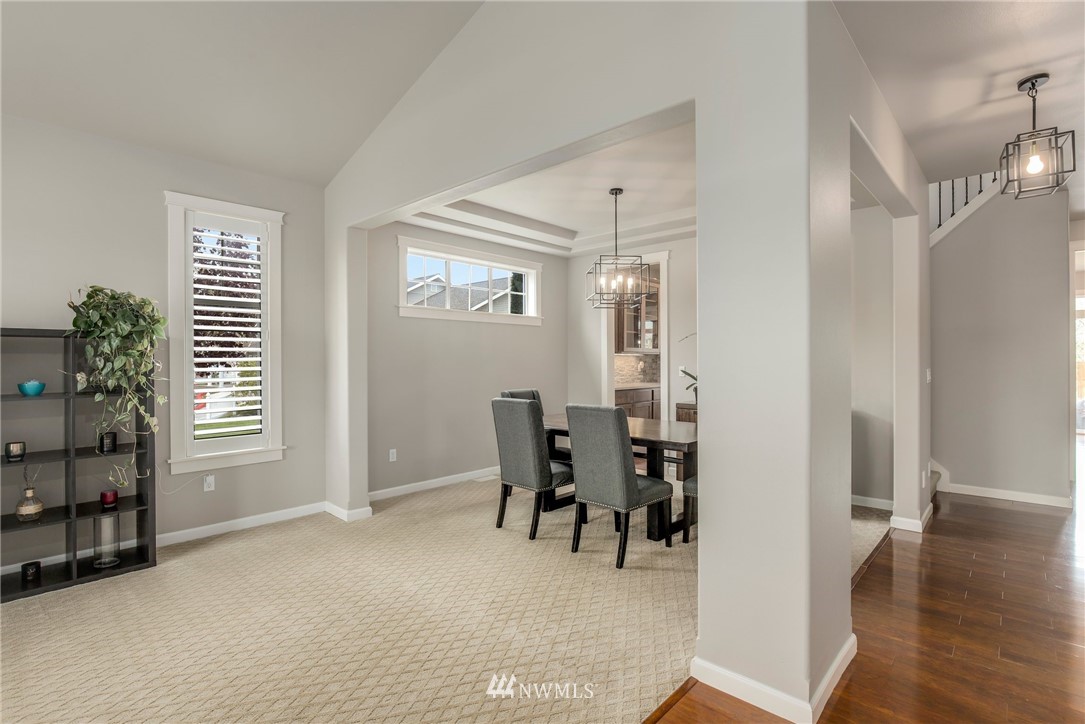 5805 Parker Road East Sumner, WA 98390 - Photo 5 of 40 a view of a room with furniture and wooden floor