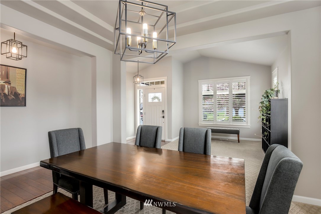 5805 Parker Road East Sumner, WA 98390 - Photo 7 of 40 a view of a dining room with furniture window and wooden floor
